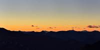 Sonnenuntergang vom Krummbachstein, Blick Richtung Westen, sogar der 133km entfernte Große Priel ist zu sehen 